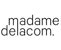 Madame de la Com Madame de la Com